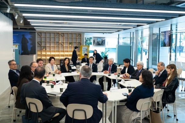 Participants in an international academic roundtable